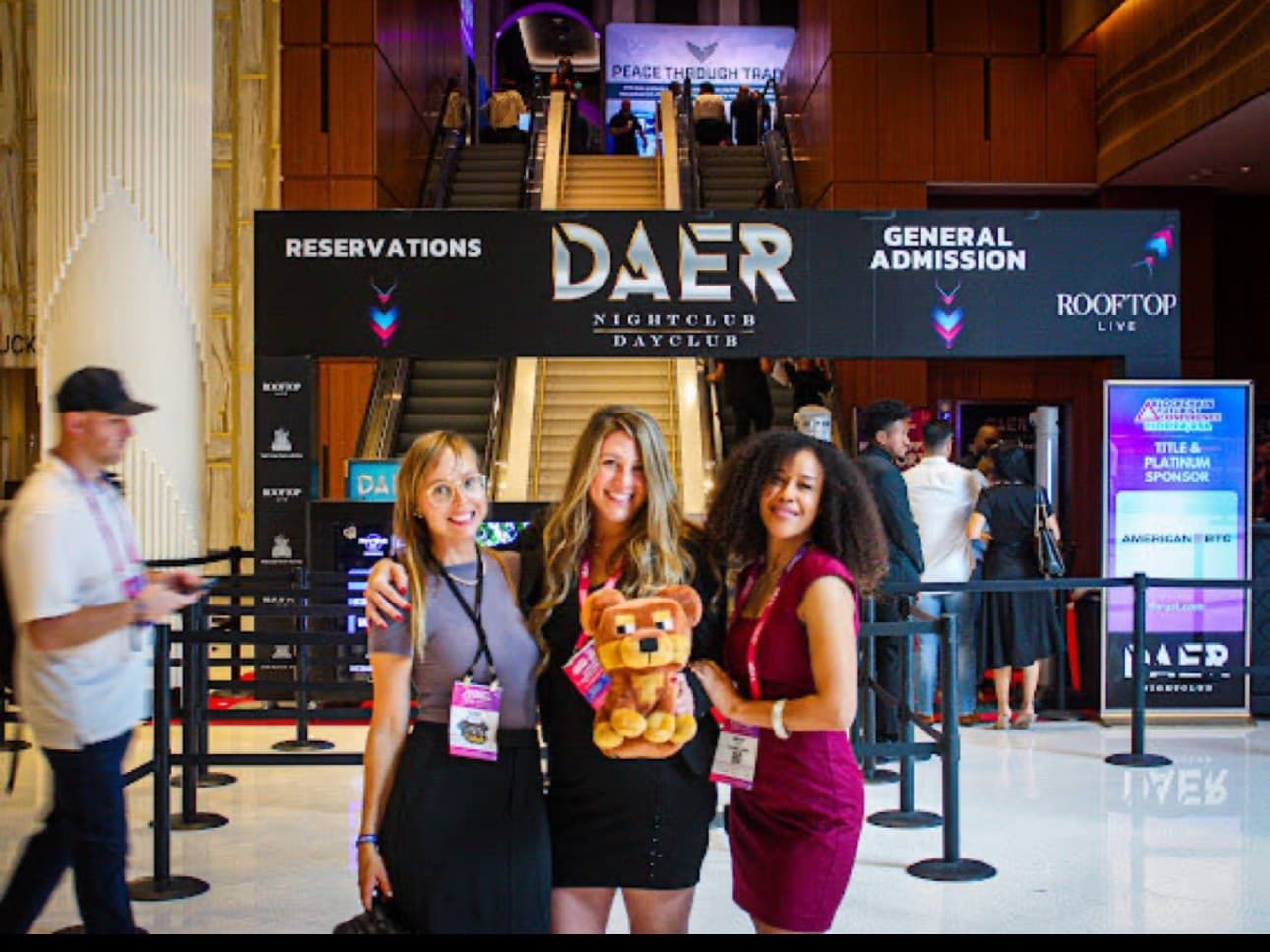 ArtsyMeta (@ArtsyMeta) with two people at the DAER nightclub entrance